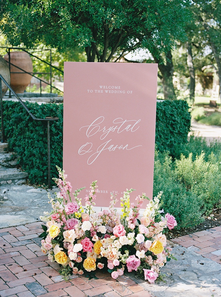 colorful spring wedding welcome sign
