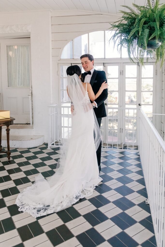 Bride and groom first look at woodbine mansion