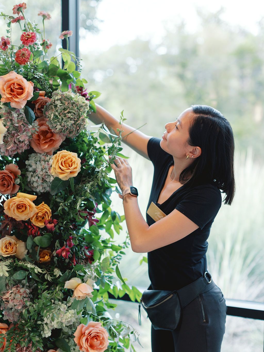 Wedding planners fixing flowers 