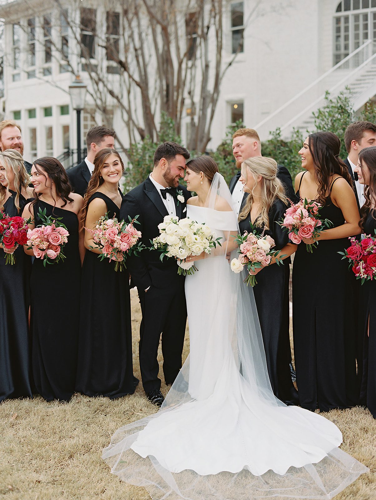 Wedding party with pink bouquets