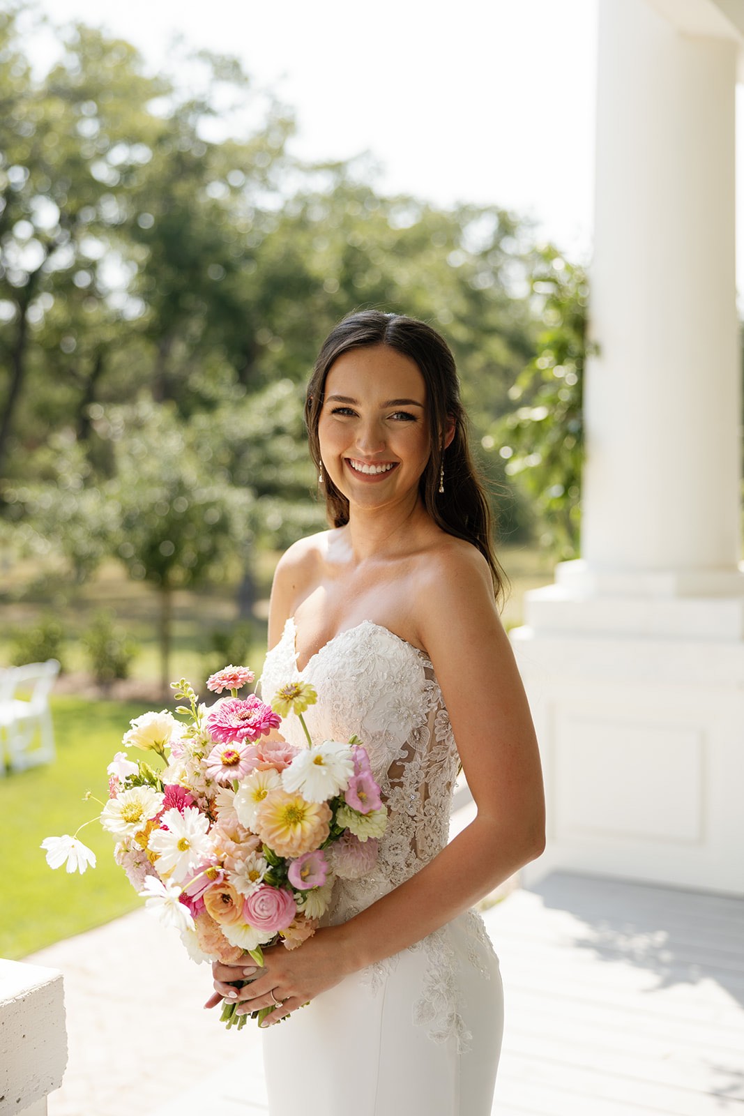 Bride with pink and yellow bouquet