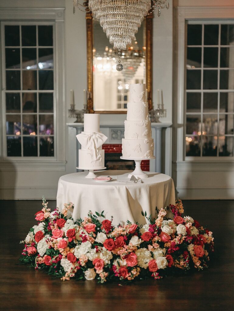 White elegant wedding cakes with pink flowers