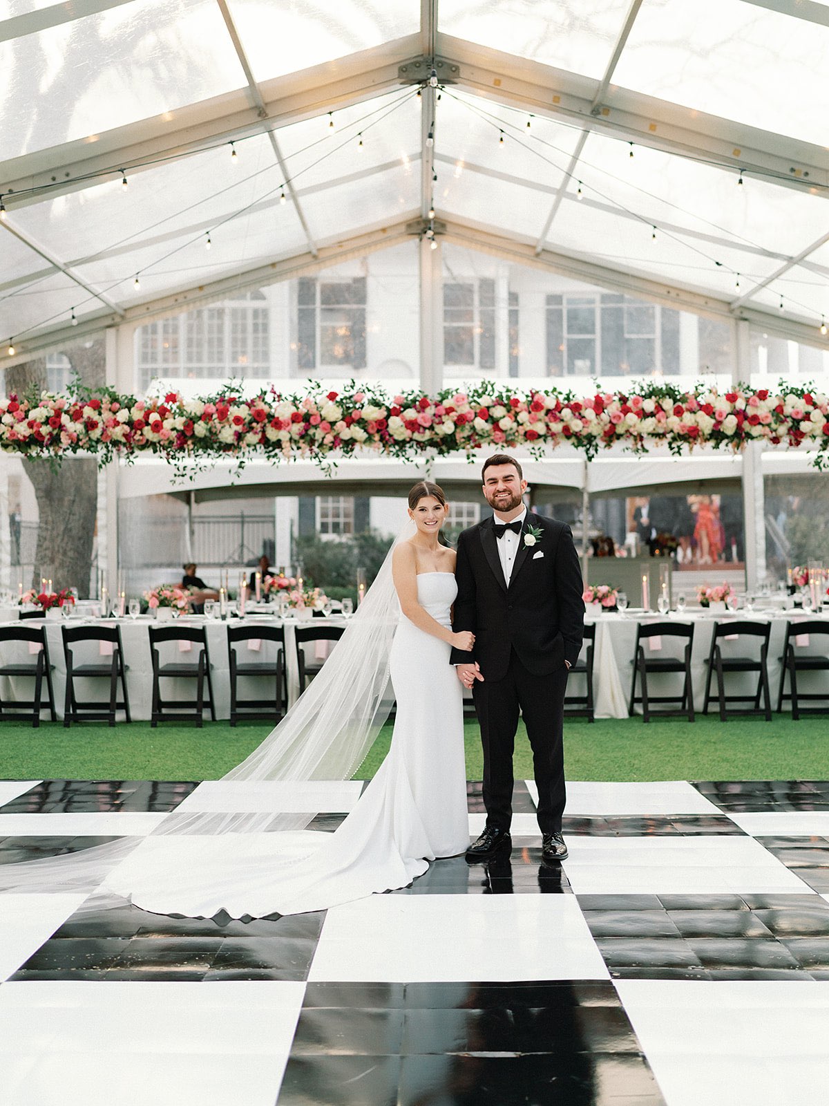 Bride and Groom in their clear tent reception space