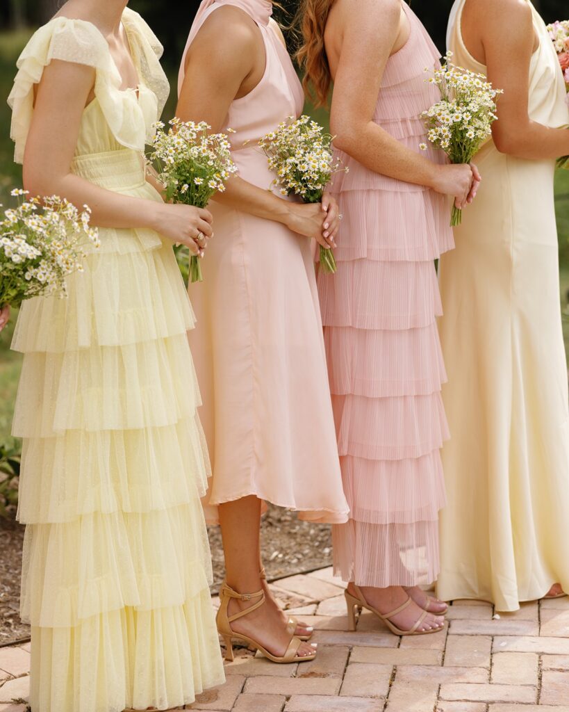 Pink and yellow bridesmaid dress inspiration at pastel garden wedding