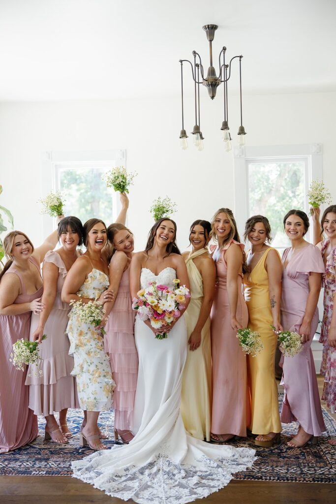 Pink and yellow bridesmaid inspiration at pastel garden wedding
