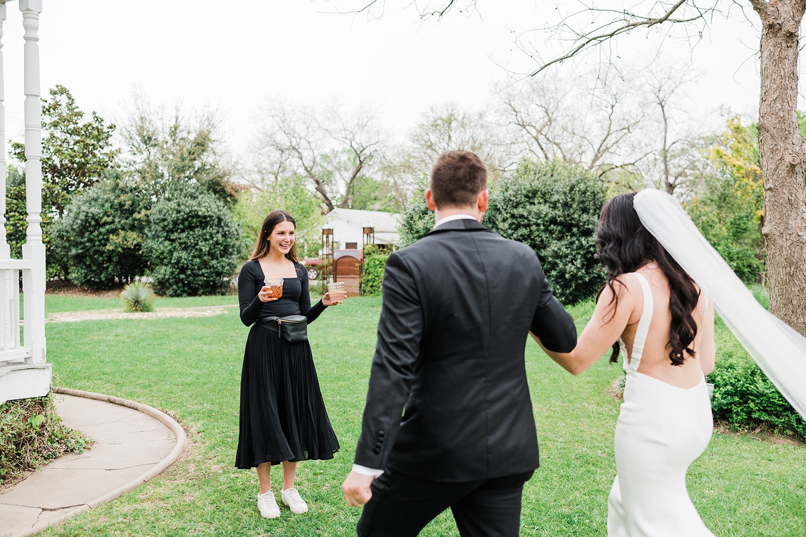 Austin wedding planner greets couple with celebratory drink