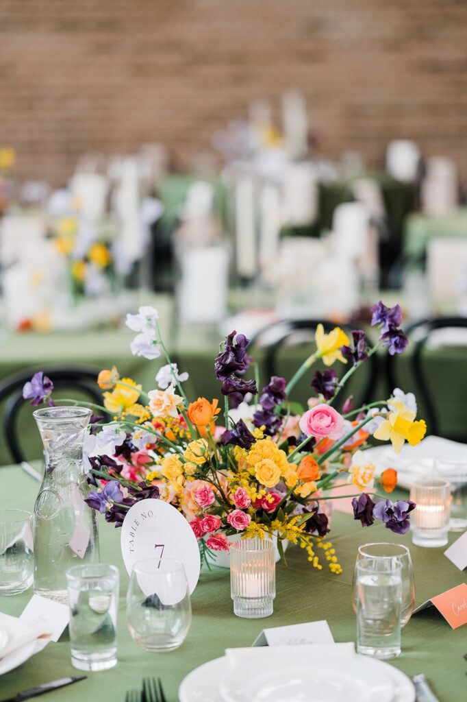Pink, yellow, purple and green colorful wedding centerpiece