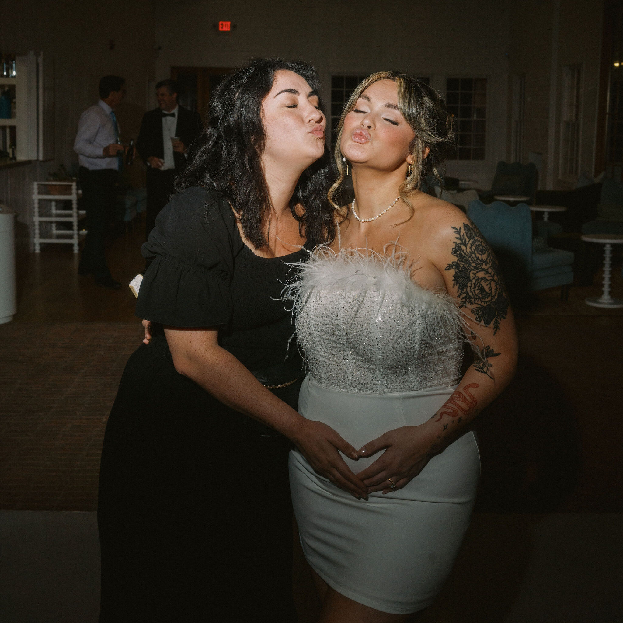 Austin wedding planner Bianca Nichole and Co posting with bride, holding baby bump