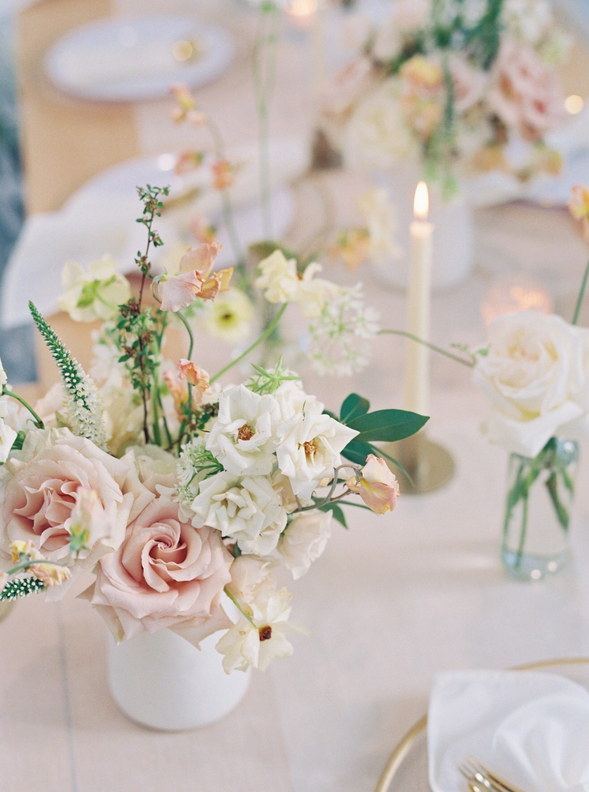 Repurposed bridal bouquet on wedding head table