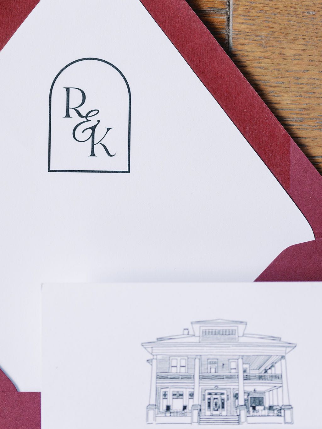 custom wedding invitation with monogram and custom venue sketch