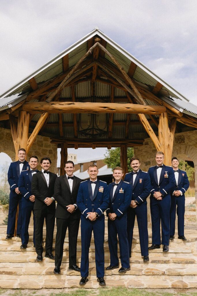 Air force groom and his military groomsmen posting for a portrait