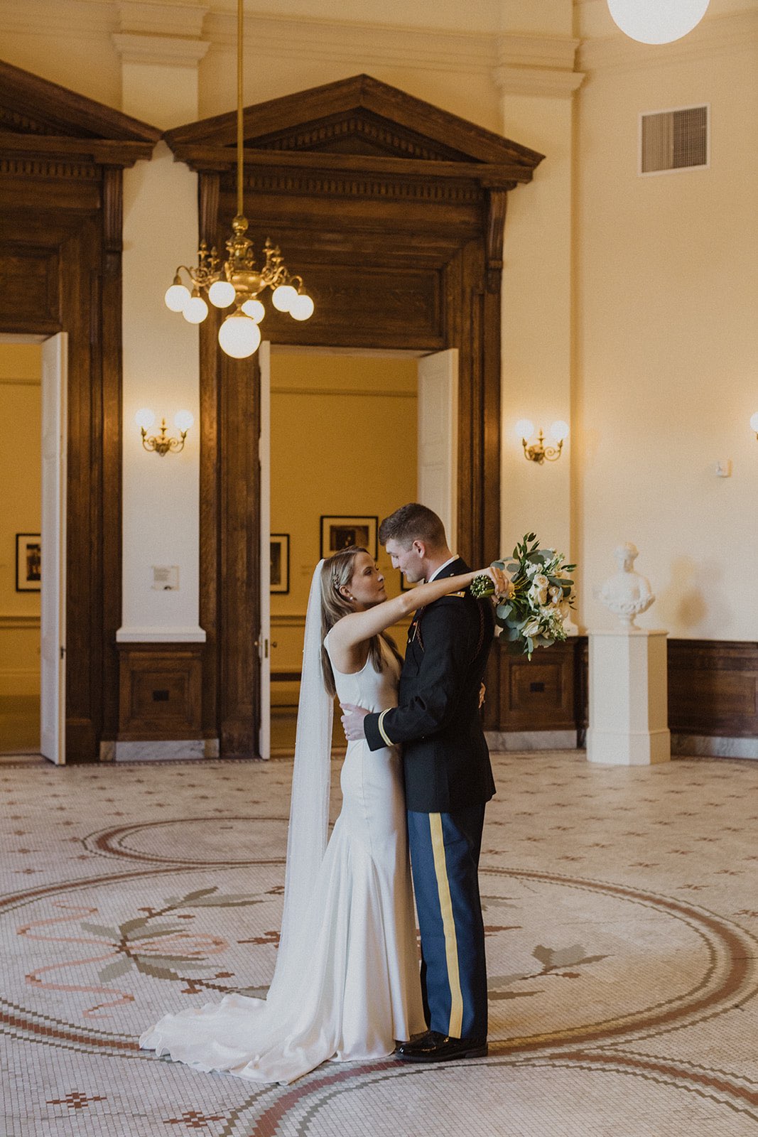 bride and groom at the gibbes museum of art in charleston historic district