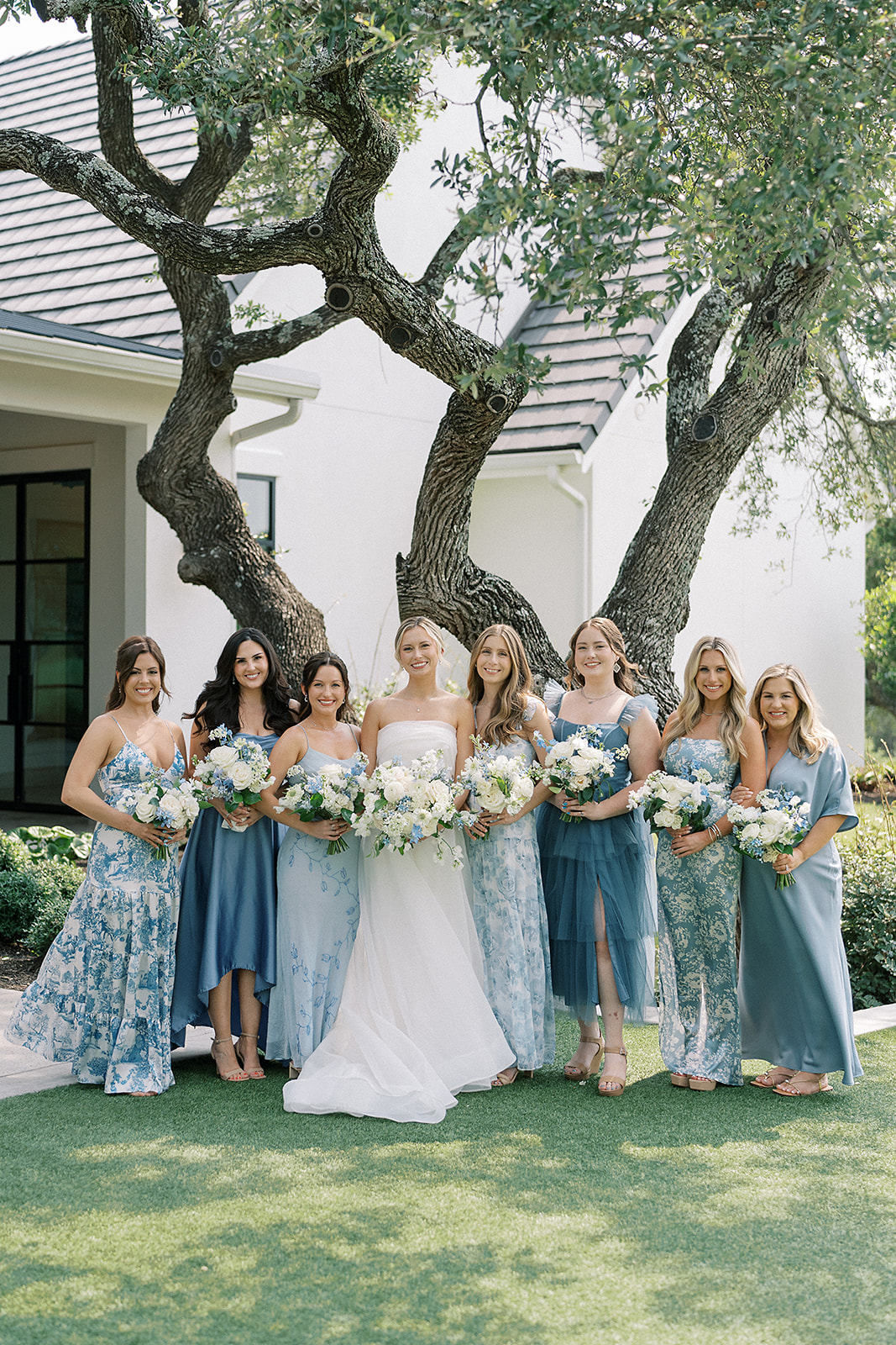 Mismatched blue patterned bridesmaid dresses