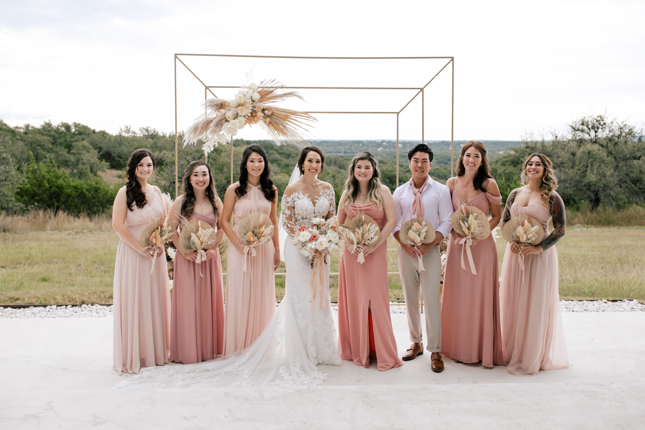 Mixed wedding party with mismatched dresses and suits