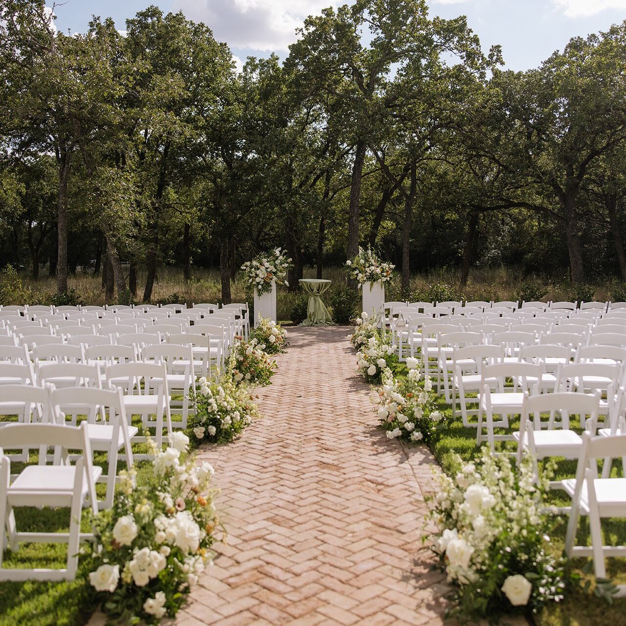 whimsical fall wedding ceremony and aisle flowers