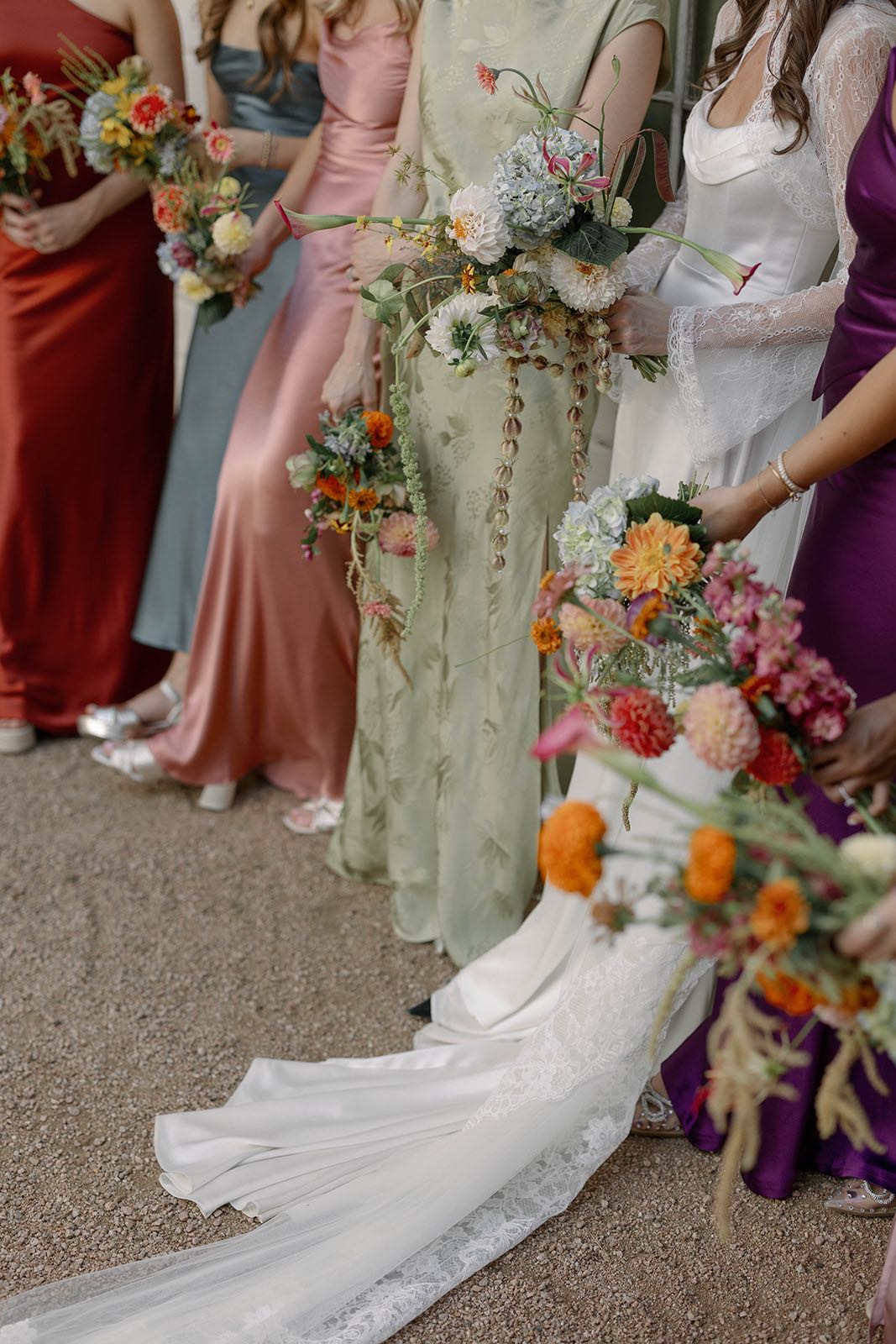 mismatched bridesmaid dresses for colorful garden wedding