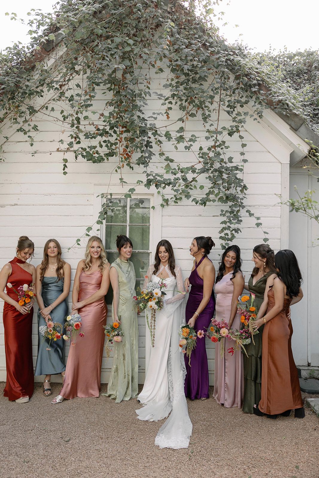 mismatched bridesmaid dresses for colorful garden wedding