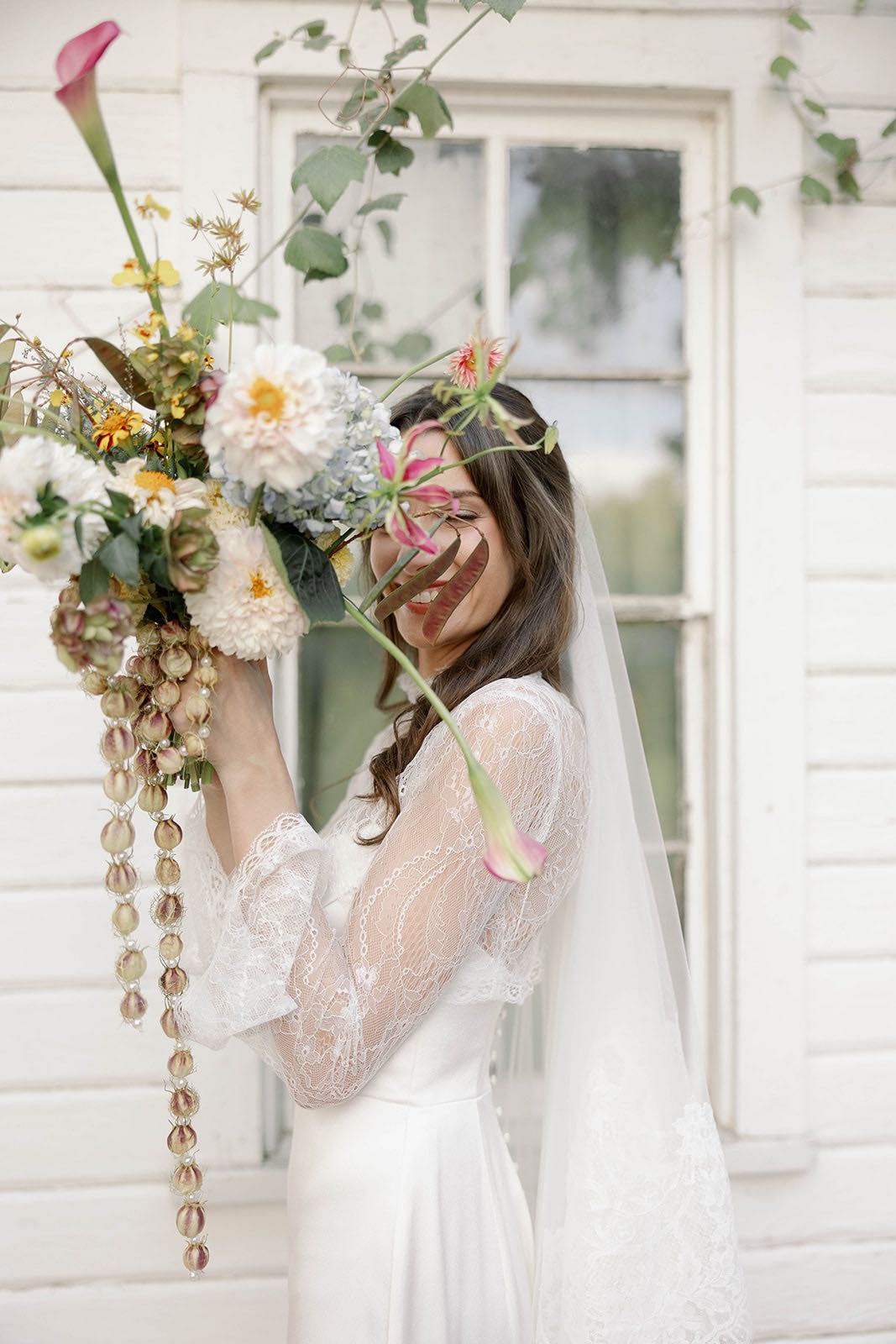 unique, whimsical bridal bouquet with pearls and dried seeds